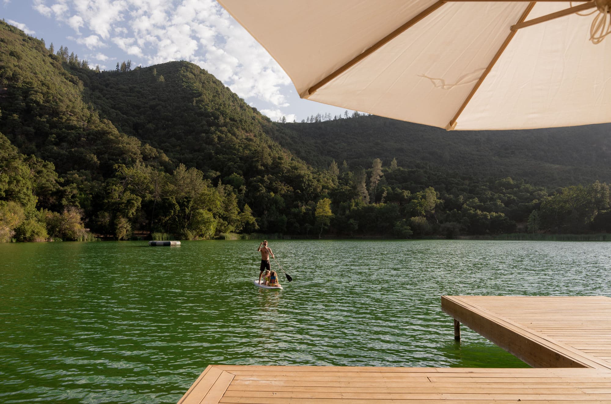 Paddleboarding across the spring-fed lake at Zaca Lake